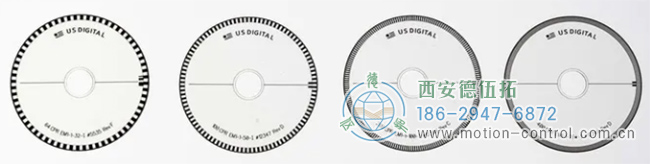 上圖顯示了四個具有不同行數的光電編碼器盤，可以觀察到行的密度不同。